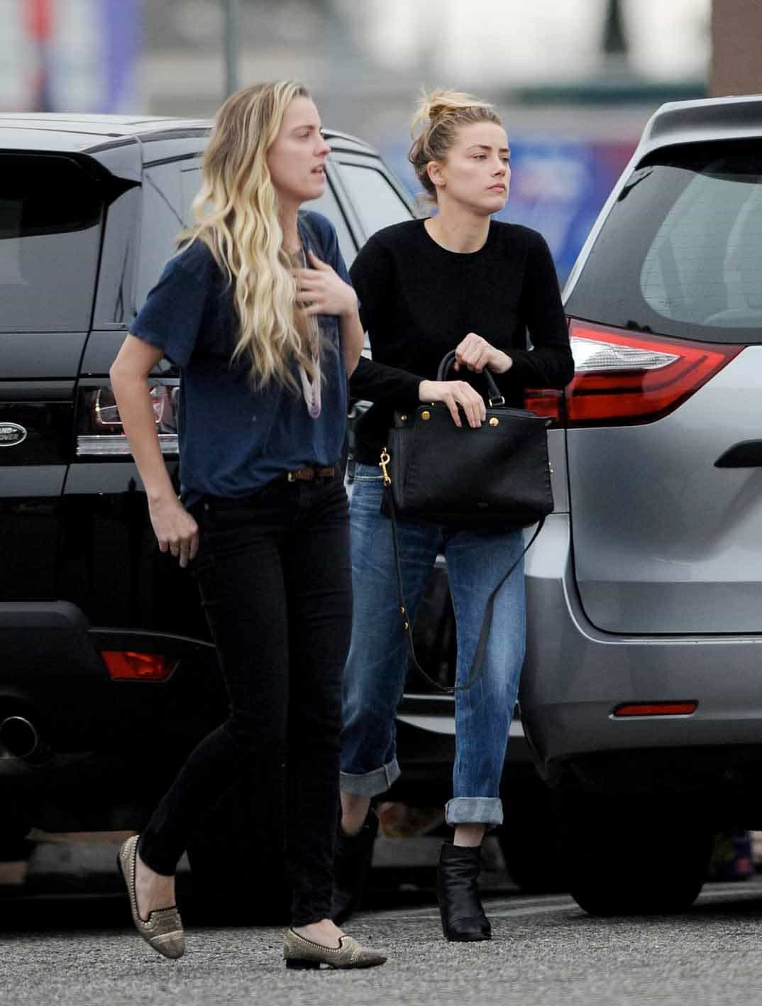 amber heard hace vida de soltera con su hermana