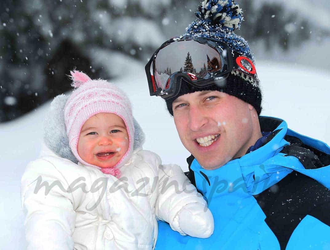 principe guillermo con su hija en la nieve