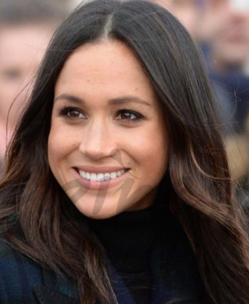 Meghan Markle conquista Escocia con un abrigo de estampado escocés