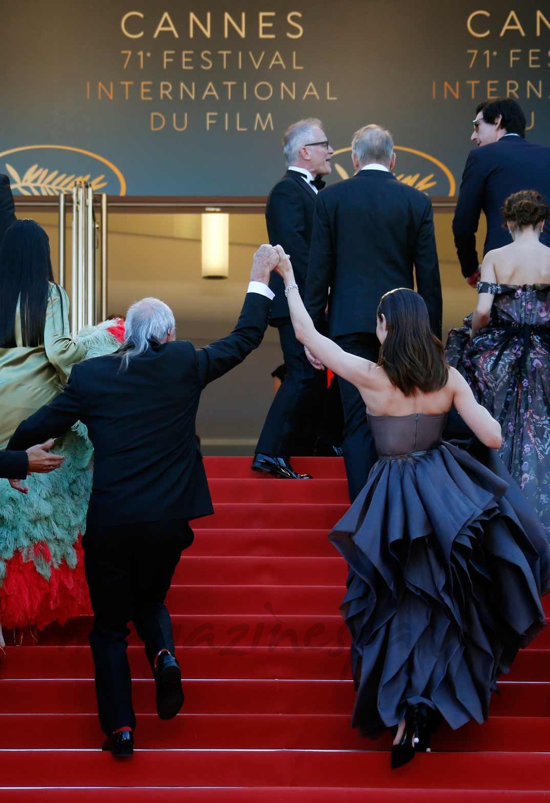 El director Terry Gilliam con Olga Kurylenko