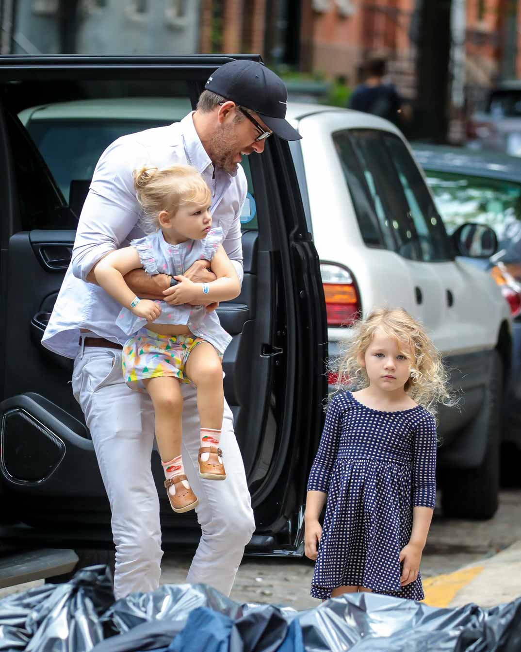 Ryan Reynolds con sus dos hijas