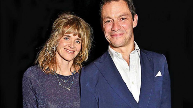 Dominic West posa con su esposa tras ser pillado besándose con Lily James