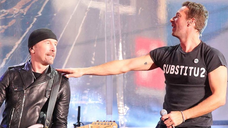 Chris Martin se divierte con U-2 y Bruce Springsteen