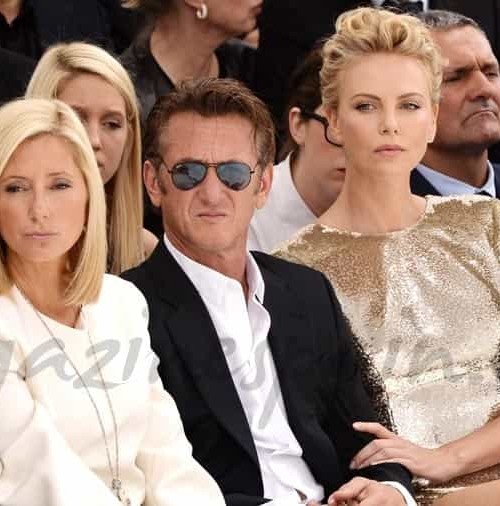 Charlize Theron y Sean Penn en el desfile de Dior